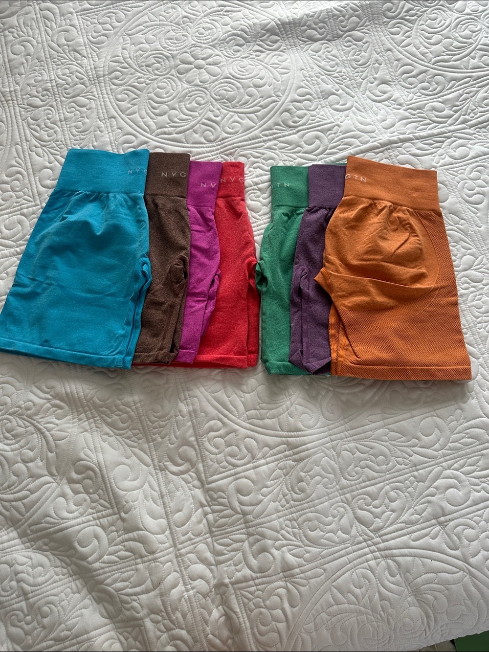 NVGTN Kids Stretch Shorts in Teal, Brown, Pink, Red, Green, Purple, Orange